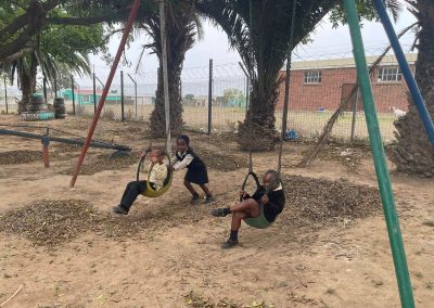 Playground sharing the swings